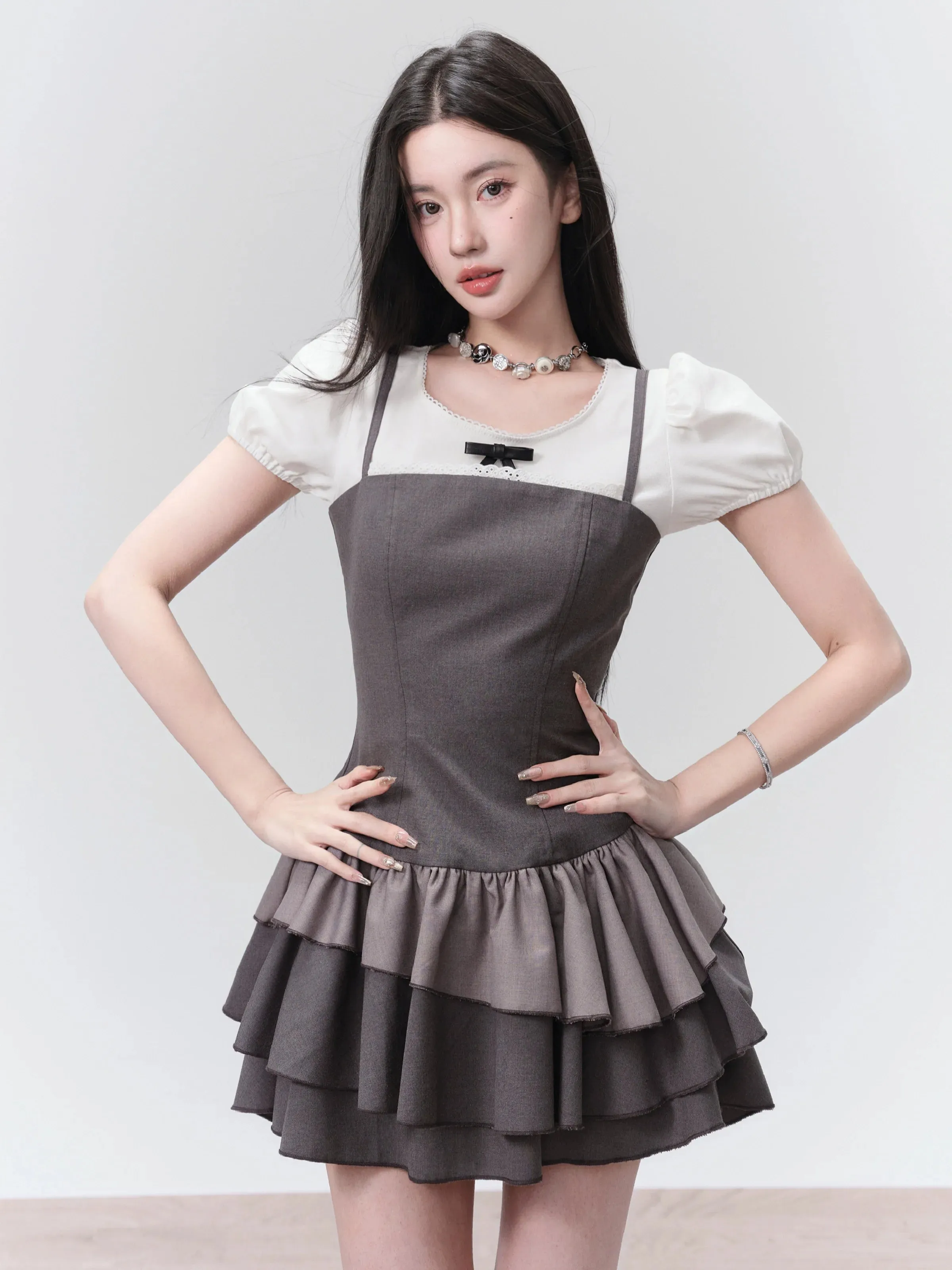 Charcoal Chic: Strapless Ruffle-Tier Mini Dress